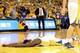 Apr 24, 2014; Oakland, CA, USA; Golden State Warriors forward Draymond Green (23) lays on the court after his sixth foul against the Los Angeles Clippers during the fourth quarter of game three of the first round of the 2014 NBA Playoffs at Oracle Arena.