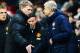 LONDON, ENGLAND - FEBRUARY 12: (L-R) Manchester United manager David Moyes and Arsenal manager Arsene Wenger shake hands at the end of the Barclays Premier League match between Arsenal and Manchester United at the Emirates Stadium on February 12, 2014 in