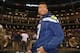 SEATTLE, WA - APRIL 08: Quarterback Russell Wilson of the Seattle Seahawks walks onto the field before throwing out the ceremonial first pitch prior to the game between the Los Angeles Angels of Anaheim and the Seattle Mariners on Opening Day at Safeco F
