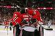 CHICAGO, IL - APRIL 23: Corey Crawford #50 of the Chicago Blackhawks gets a hug from teammates Niklas Hjlamarsson #4 (L) and Michal Handzus #26 after a win against the St. Louis Blues in Game Four of the First Round of the 2014 NHL Stanley Cup Playoffs at