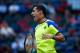 SHANGHAI, CHINA - OCTOBER 11: Nicolas Almagro of Spain reacts after losing a ball against Juan Martin Del Potro of Argentina during day five of the Shanghai Rolex Masters at the Qi Zhong Tennis Center on October 11, 2013 in Shanghai, China. (Photo by Lin