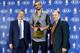LINCOLNSHIRE, IL - APRIL 21: Joakim Noah of the Chicago Bulls, center, poses for a photo with Chicago Bulls Head Coach Tom Thibodeau, right, and Chicago Bulls General Manager Gar Forman, left, after receiving KIA NBA Defensive Player of the Year award dur