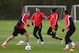MANCHESTER, ENGLAND - APRIL 08: Ashley Young of Manchester United challenges Ryan Giggs during a training session at Aon Training Complex on April 8, 2014 in Manchester, England. (Photo by Alex Livesey/Getty Images)