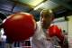 GOLD COAST, AUSTRALIA - APRIL 02: Alex Leapai of Australia hits the pads during a media session at PCYC Gym on April 2, 2014 in Gold Coast, Australia. Lepai is in training for his April 26th World Heavyweight title bout in Germany against Wladmir Klitsch