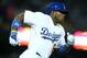 LOS ANGELES, CA - APRIL 23: Yasiel Puig #66 of the Los Angeles Dodgers runs to first on his way to an RBI triple in the seventh inning against the Philadelphia Phillies at Dodger Stadium on April 23, 2014 in Los Angeles, California. (Photo by Stephen Du