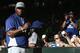 PHOENIX, AZ - APRIL 11: Yasiel Puig #66 of the Los Angeles Dodgers signs autographs for fans before the MLB game against the Arizona Diamondbacks at Chase Field on April 11, 2014 in Phoenix, Arizona. (Photo by Christian Petersen/Getty Images)
