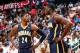 ATLANTA, GA - APRIL 24: Paul George #24 and Roy Hibbert #55 of the Indiana Pacers react after a foul in Game 3 of the Eastern Conference Quarterfinals during the 2014 NBA Playoffs against the Atlanta Hawks at Philips Arena on April 24, 2014 in Atlanta, G