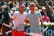PARIS, FRANCE - JUNE 07: Rafael Nadal of Spain poses at the net with Novak Djokovic of Serbia before their men's singles semi-final match on day thirteen of the French Open at Roland Garros on June 7, 2013 in Paris, France. (Photo by Julian Finney/Getty