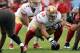 TAMPA, FL - DECEMBER 15: Quarterback Colin Kaepernick #7 of the San Francisco 49ers sets for play behind center Jonathan Goodwin #59 against the Tampa Bay Buccaneers December 15, 2013 at Raymond James Stadium in Tampa, Florida. (Photo by Al Messerschmid