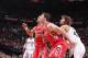 PORTLAND, OR - APRIL 25: Omer Asik #3 and Chandler Parsons #25 of the Houston Rockets battle for position against Robin Lopez #42 of the Portland Trail Blazers in Game Three of the Western Conference Quarterfinals during the 2014 NBA Playoffs on April 25,