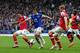 LIVERPOOL, ENGLAND - APRIL 06: Mikel Arteta and Per Mertesacker of Arsenal competes with Leighton Baines of Everton during the Barclays Premier League match between Everton and Arsenal at Goodison Park on April 6, 2014 in Liverpool, England. (Photo by A