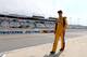 RICHMOND, VA - APRIL 25: Kyle Busch, driver of the #54 Monster Energy Toyota, walks on the grid during qualifying for the NASCAR Nationwide Series ToyotaCare 250 at Richmond International Raceway on April 25, 2014 in Richmond, Virginia. Busch wore his Spr