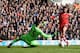 LONDON, ENGLAND - MARCH 23: Adam Lallana of Southampton scores his team's second goal past Hugo Lloris of Tottenham Hotspur during the Barclays Premier League match between Tottenham Hotspur and Southampton at White Hart Lane on March 23, 2014 in London,