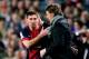 BARCELONA, SPAIN - MAY 05: Lionel Messi of Barcelona speaks with Tito Vilanova the Barcelona head coach as he prepares to come off the bench during the La Liga match between FC Barcelona and Real Betis Balompie at Camp Nou on May 5, 2013 in Barcelona, Sp