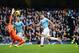MANCHESTER, ENGLAND - NOVEMBER 24: Sergio Aguero of Manchester City has a shot saved by goalkeeper Hugo Lloris of Tottenham Hotspur during the Barclays Premier League match between Manchester City and Tottenham Hotspur at Etihad Stadium on November 24, 2