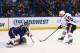 ST. LOUIS, MO - APRIL 25: Jonathan Toews #19 of the Chicago Blackhawks scores the game-winning goal against Ryan Miller #39 of the St. Louis Blues in Game Five of the First Round of the 2014 Stanley Cup Playoffs at the Scottrade Center on April 25, 2014 i
