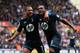 STOKE ON TRENT, ENGLAND - APRIL 26: Danny Rose of Tottenham Hotspur celebrates with Aaron Lennon after scoring the opening goal during the Barclays Premier League match between Stoke City and Tottenham Hotspur at the Britannia Stadium on April 26, 2014 i