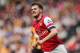 HULL, ENGLAND - APRIL 20: Aaron Ramsey of Arsenal celebrates scoring his sides first goal during the Barclays Premier League match between Hull City and Arsenal at KC Stadium on April 20, 2014 in Hull, England. (Photo by Scott Heavey/Getty Images)