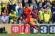 NORWICH, ENGLAND - APRIL 20: Raheem Sterling of Liverpool celebrates scoring their third goal during the Barclays Premier League match between Norwich City and Liverpool at Carrow Road on April 20, 2014 in Norwich, England. (Photo by Michael Regan/Getty