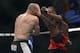 Apr 26, 2014; Baltimore, MD, USA; Jon Jones kicks Glover Teixeira in the head during the UFC light heavy weight championship fight at Baltimore Arena. Jones retained the light heavy height championship by defeating Teixeria. Mandatory Credit: Tommy Gi