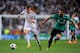 MADRID, SPAIN - MARCH 18: Gareth Bale of Real Madrid is pursued by Sead Kolasinac of Schalke during the UEFA Champions League Round of 16, second leg match between Real Madrid and FC Schalke 04 at Estadio Santiago Bernabeu on March 18, 2014 in Madrid, Sp
