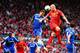 LIVERPOOL, ENGLAND - APRIL 27: Branislav Ivanovic of Chelsea and Martin Skrtel of Liverpool compete for the ball during the Barclays Premier League match between Liverpool and Chelsea at Anfield on April 27, 2014 in Liverpool, England. (Photo by Clive Br
