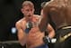 Sep 21, 2013; Toronto, Ontario, CAN; Alexander Gustafsson (left) fights Jon Jones during their Light Heavyweight Championship bout at UFC 165 at the Air Canada Centre. Mandatory Credit: Tom Szczerbowski-USA TODAY Sports