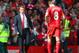 LIVERPOOL, ENGLAND - APRIL 27: Manager Brendan Rodgers of Liverpool looks to a dejected Steven Gerrard of Liverpool at the end of the match during the Barclays Premier League match between Liverpool and Chelsea at Anfield on April 27, 2014 in Liverpool,