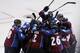 Apr 26, 2014; Denver, CO, USA; Members of the Colorado Avalanche celebrate after forward Nathan MacKinnon (29) scored the game winning goal during the overtime period in game five of the first round of the 2014 Stanley Cup Playoffs against the Minnesota W