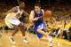 Apr 24, 2014; Oakland, CA, USA; Los Angeles Clippers guard J.J. Redick (4) drives in against Golden State Warriors forward Harrison Barnes (40) during the third quarter of game three of the first round of the 2014 NBA Playoffs at Oracle Arena. The Los Ang
