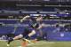 Feb 23, 2014; Indianapolis, IN, USA; Texas A&M Aggies quarterback Johnny Manziel runs the shuttle dash during the 2014 NFL Combine at Lucas Oil Stadium. Mandatory Credit: Brian Spurlock-USA TODAY Sports