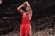 PORTLAND, OR - APRIL 25: Chandler Parsons #25 of the Houston Rockets shoots against the Portland Trail Blazers in Game Three of the Western Conference Quarterfinals during the 2014 NBA Playoffs on April 25, 2014 at the Moda Center in Portland, Oregon. NOT