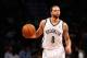 Apr 25, 2014; Brooklyn, NY, USA; Brooklyn Nets guard Deron Williams (8) advances the ball during the third quarter against the Toronto Raptors in game three of the first round of the 2014 NBA Playoffs at Barclays Center. Brooklyn Nets won 102-98. Mandato