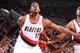 PORTLAND, OR - APRIL 27: LaMarcus Aldridge #12 of the Portland Trail Blazers battles for position against the Houston Rockets in Game Four of the Western Conference Quarterfinals during the 2014 NBA Playoffs on April 27, 2014 at the Moda Center in Portlan
