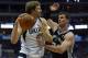 DALLAS, TX - APRIL 26: Dirk Nowitzki #41 of the Dallas Mavericks drives to the basket against Tiago Splitter #22 of the San Antonio Spurs during Game Three of the Western Conference Quarterfinals during the 2014 NBA Playoffs at American Airlines Center o
