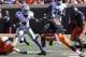 Oct 5, 2013; Stillwater, OK, USA; Kansas State Wildcats quarterback Daniel Sams (4) runs for yardage against the Oklahoma State Cowboys during the first quarter at Boone Pickens Stadium. Mandatory Credit: Richard Rowe-USA TODAY Sports