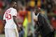 ROME, ITALY - APRIL 25: AC Milan head coach Clarence Seedorf speaks with Mario Balotelli during the Serie A match between AS Roma and AC Milan at Stadio Olimpico on April 25, 2014 in Rome, Italy. (Photo by Paolo Bruno/Getty Images)