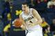 ANN ARBOR, MI - DECEMBER 07: Mitch McGary #4 of the University of Michigan Wolverines drives the ball up the court during the second half of the game against Houston Baptist Huskies at the Crisler Center on December 7, 2013 in Ann Arbor, Michigan. Michig