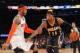 Mar 19, 2014; New York, NY, USA; Indiana Pacers small forward Paul George (24) controls the ball against New York Knicks small forward Carmelo Anthony (7) during the third quarter of a game at Madison Square Garden. The Knicks defeated the Pacers 92-86. M
