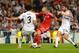 MADRID, SPAIN - APRIL 23: Arjen Robben of Bayern Muenchen shoots under pressure from Pepe and Xabi Alonso of Real Madrid during the UEFA Champions League semi-final first leg match between Real Madrid and FC Bayern Muenchen at the Estadio Santiago Bernab