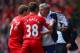 LIVERPOOL, ENGLAND - APRIL 27: Steven Gerrard and Jon Flanagan of Liverpool have words with Jose Mourinho manager of Chelsea during the Barclays Premier League match between Liverpool and Chelsea at Anfield on April 27, 2014 in Liverpool, England. (Phot