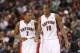 Oct 11, 2013; Toronto, Ontario, CAN; Toronto Raptors point guard Kyle Lowry (7) talks to guard DeMar DeRozan (10) against the New York Knicks at Air Canada Centre. The Raptors beat the Knicks 100-91. Mandatory Credit: Tom Szczerbowski-USA TODAY Sports