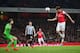 LONDON, ENGLAND - APRIL 28: Olivier Giroud of Arsenal heads the ball past goalkeeper Tim Krul of Newcastle United to score their third goal during the Barclays Premier League match between Arsenal and Newcastle United at Emirates Stadium on April 28, 201