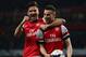 LONDON, ENGLAND - APRIL 28: Laurent Koscielny of Arsenal celebrates wth Olivier Giroud (L) as he scores their first goal during the Barclays Premier League match between Arsenal and Newcastle United at Emirates Stadium on April 28, 2014 in London, Englan