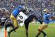 PASADENA, CA - NOVEMBER 02: Wide receiver Paul Richardson #6 of the Colorado Buffaloes makes a seven touchdown catch between defensive backs Fabian Moreau #10 and Randall Goforth #3 of the UCLA Bruins in the scond quarter at the Rose Bowl on November 2, 2