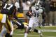 IOWA CITY, IOWA - OCTOBER 5: Cornerback Darqueze Dennard #31 of the Michigan State Spartans runs back an interception up field during the first quarter in front of wide receiver Riley McCarron #83 of the Iowa Hawkeyes on October 5, 2013 at Kinnick Stadiu