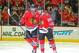 Apr 27, 2014; Chicago, IL, USA; Chicago Blackhawks right wing Patrick Kane (88) congratulates left wing Patrick Sharp (10) for scoring a goal during the third period in game six of the first round of the 2014 Stanley Cup Playoffs against the St. Louis Blu