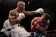 BOSTON - MAY 13: Luis Collazo (L) follows through on a left to Ricky Hatton of England during their Welterweight WBA World Title fight at the TD Banknorth Garden on May 13, 2006 in Boston, Massachusetts. (Photo by Nick Laham/Getty Images)