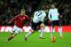 LONDON, ENGLAND - MARCH 05: Adam Lallana of England evades Kasper Kusk of Denmark during the International Friendly match between England and Denmark at Wembley Stadium on March 5, 2014 in London, England. (Photo by Richard Heathcote/Getty Images)