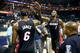 CHARLOTTE, NC - APRIL 28: LeBron James #6 of the Miami Heat celebrates with teammate Chris Bosh after defeating the Charlotte Bobcats 109-98 in Game Four of the Eastern Conference Quarterfinals during the 2014 NBA Playoffs at Time Warner Cable Arena on A